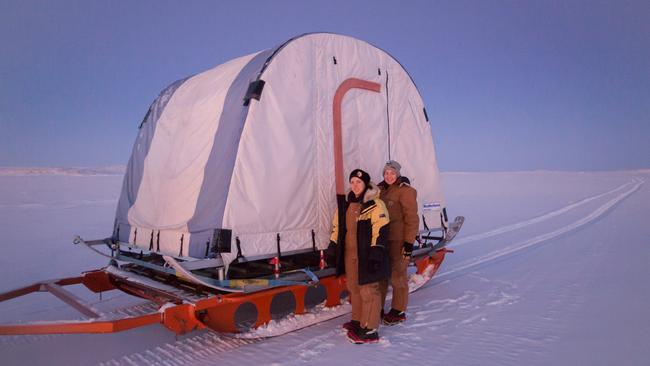 Research Scientist Sarah Payne (Right) and Alyce Hancock with their mobile work shelter, which is towed behind a Hagglunds out to the sampling Lakes.