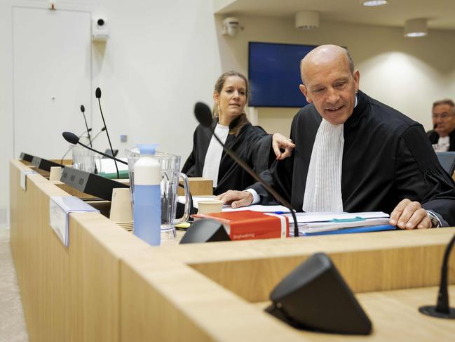 Boudewijn van Eijck (R) and Sabine ten Doesschate, defence lawyers of suspect Oleg Pulatov, in court. Picture: AFP