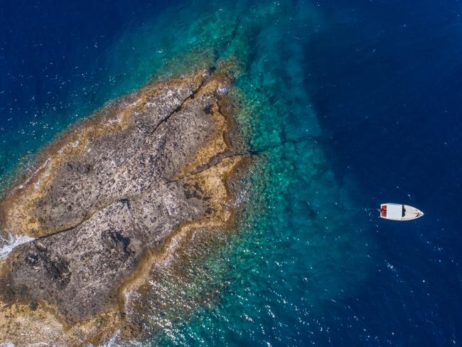 This piece of land, surrounded by emerald green waters, is the island of Zannone.