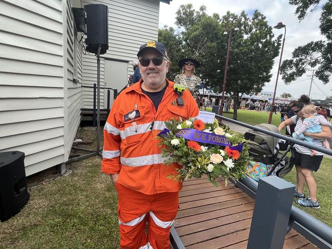 Sherif Roberts from the SES laying the wreath on Anzac Day in Hervey Bay.