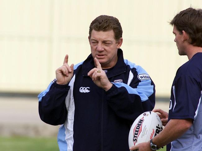 MAY 23, 2004: Matthew (Matt) Gidley (R) listens as coach Phil Gould speaks during NSW State of Origin team training session at Wentworth Park in Sydney, 23/05/04. Pic Chris Hyde. Rugby League