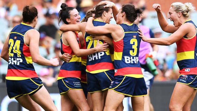 Chelsea Randall celebrates with teammates after kicking a goal against Geelong in the preliminary final. Picture: Mark Brake/Getty Images