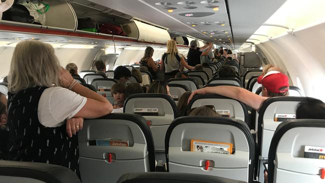 Passengers on board Melbourne to Hobart Jetstar flight JQ713, which was stuck on the tarmac at Hobart Airport for more than an hour and a half as emergency services responded to an unwell passenger. Picture: Supplied