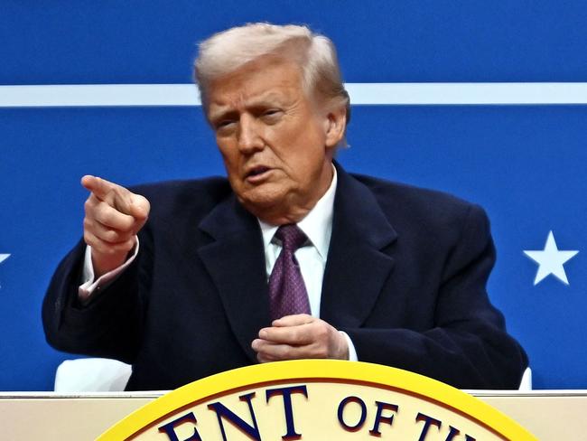 US President Donald Trump gestures as he attends the inaugural parade inside Capital One Arena, in Washington, DC, on January 20, 2025. Picture: Angela Weiss / AFP