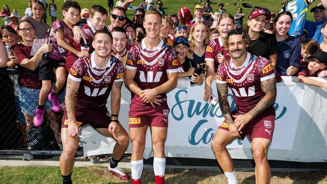 Kalyn Ponga, Daly Cherry-Evans and Jesse Arthars with Queensland fans at the Maroons open training day. Picture Lachie Millard