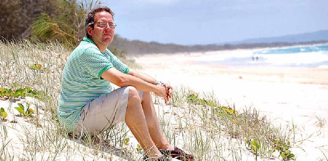 NO HAPPY ENDING: Andreas Krauchi on the beach in front of his Rainbow Shores development. Picture: Craig Warhurst C