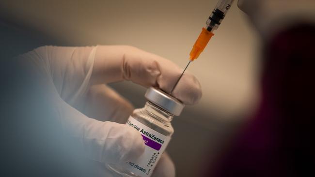 A pharmacist prepares a dose of the AstraZeneca COVID-19 vaccine. Picture: Loic Venance/AFP