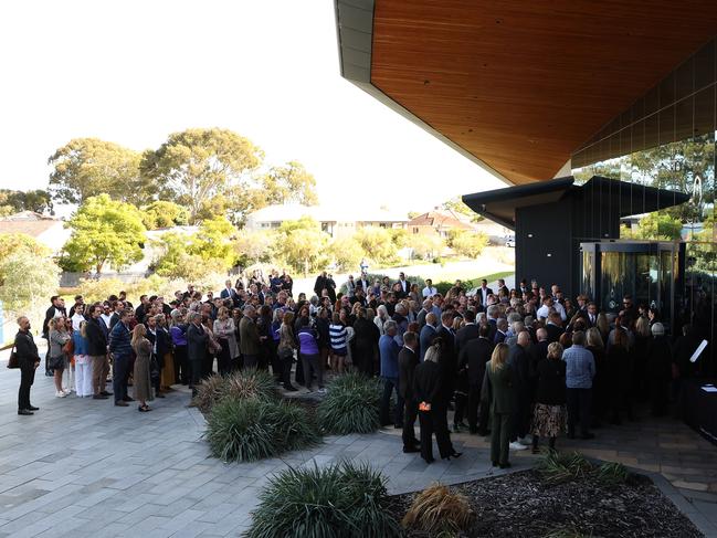 Mourners wait to enter for the memorial service for Adam Selwood. Picture: AFL Photos/via Getty Images