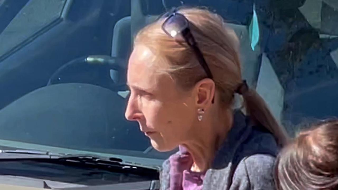 Alexandra Dubrovskaya (left) leaves Toowoomba Magistrates Court after being sentenced on August 17, 2022.