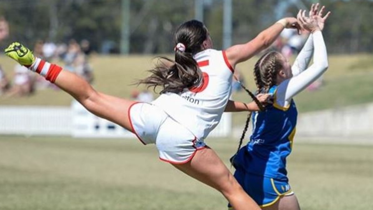 A women's footy player in New South Wales was snapped in this incredible action shot.