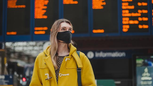 People around the country are recognising that wearing a mask while travelling – whether it be on public transport or on a plane – might not be a bad idea. Picture: Getty