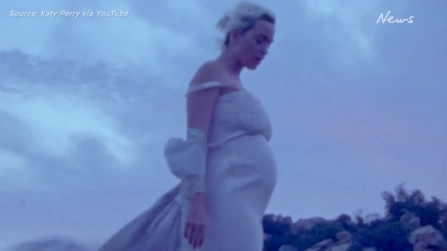 Katy Perry shows off baby bump in Daisies music video