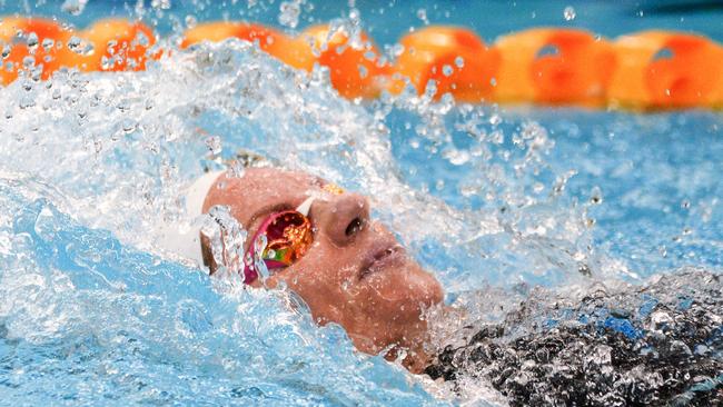 Emily Seebohm competes in a women's 100m backstroke heat during day two of the Australian Olympic swimming trials in Adelaide. Picture: AFP