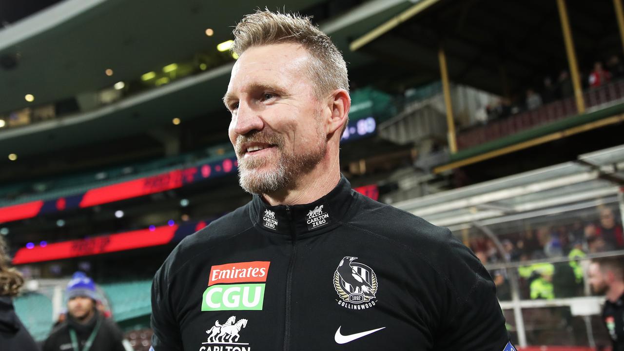 SYDNEY, AUSTRALIA - JUNE 14: Magpies head coach Nathan Buckley celebrates victory after coaching his final match for the Magpies during the round 13 AFL match between the Melbourne Demons and the Collingwood Magpies at Sydney Cricket Ground on June 14, 2021 in Sydney, Australia. (Photo by Matt King/Getty Images)