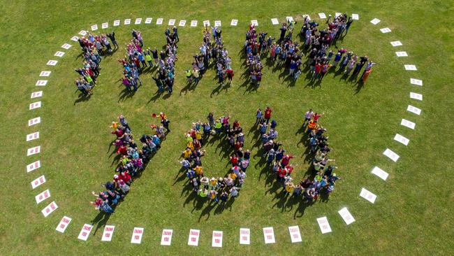 An aerial image of Marysville residents saying thank you to Victorians for the kind of support that has helped the town get back on its feet, a decade after Black Saturday.