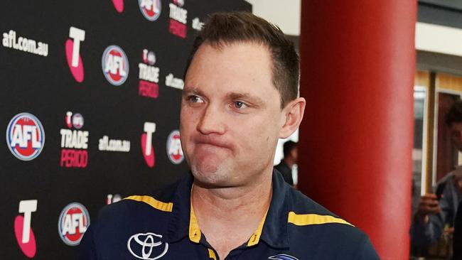 Adelaide Crows list manager Justin Reid leaves after the opening day of the AFL trade period as club representatives begin trade discussions in Melbourne, Monday, October 7, 2019. (AAP Image/Michael Dodge) NO ARCHIVING