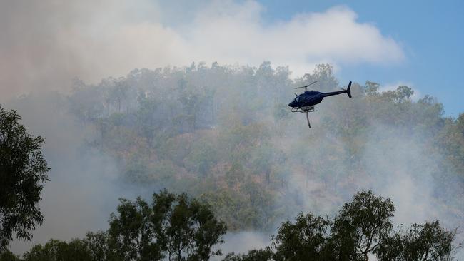 Fire, smoke and water-carrying helicopters as seen from a property at Serene Court, Nome, about 10 minutes after a prepare to leave emergency text message went out to all phones in the area. Picture: Blair Jackson