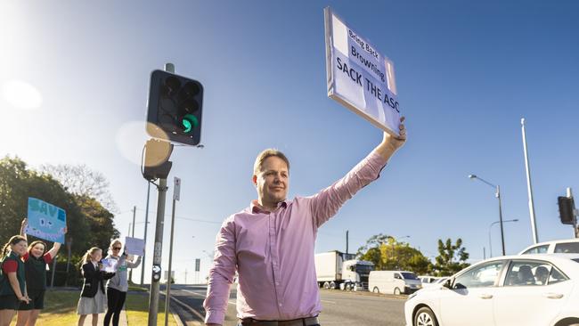 Kye Macdonald protests outside St Paul’s School demanding principal Dr Paul Browning be reinstated.