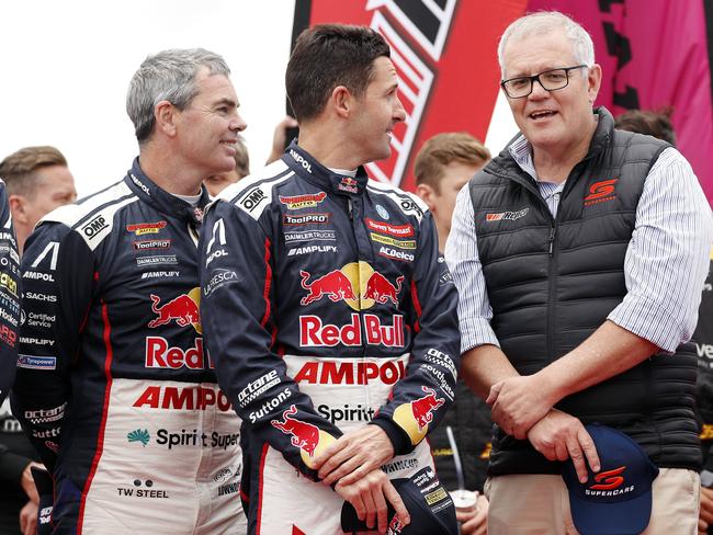 SATURDAY TELEGRAPH. DECEMBER 5, 2021.Pictured is Prime Minister Scott Morrison speaking with Craig Lowndes and Jamie Whincup while visiting Mount Panorama today at the Repco Bathurst 1000. Picture: Tim Hunter.