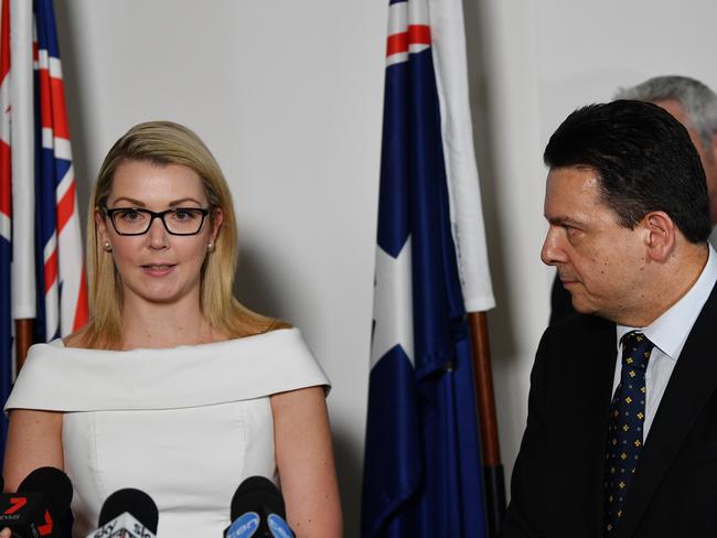 Senator Skye Kakoschke-Moore announces her resignation, as Party Leader Nick Xenophon looks on. Picture: AAP Image/David Mariuz