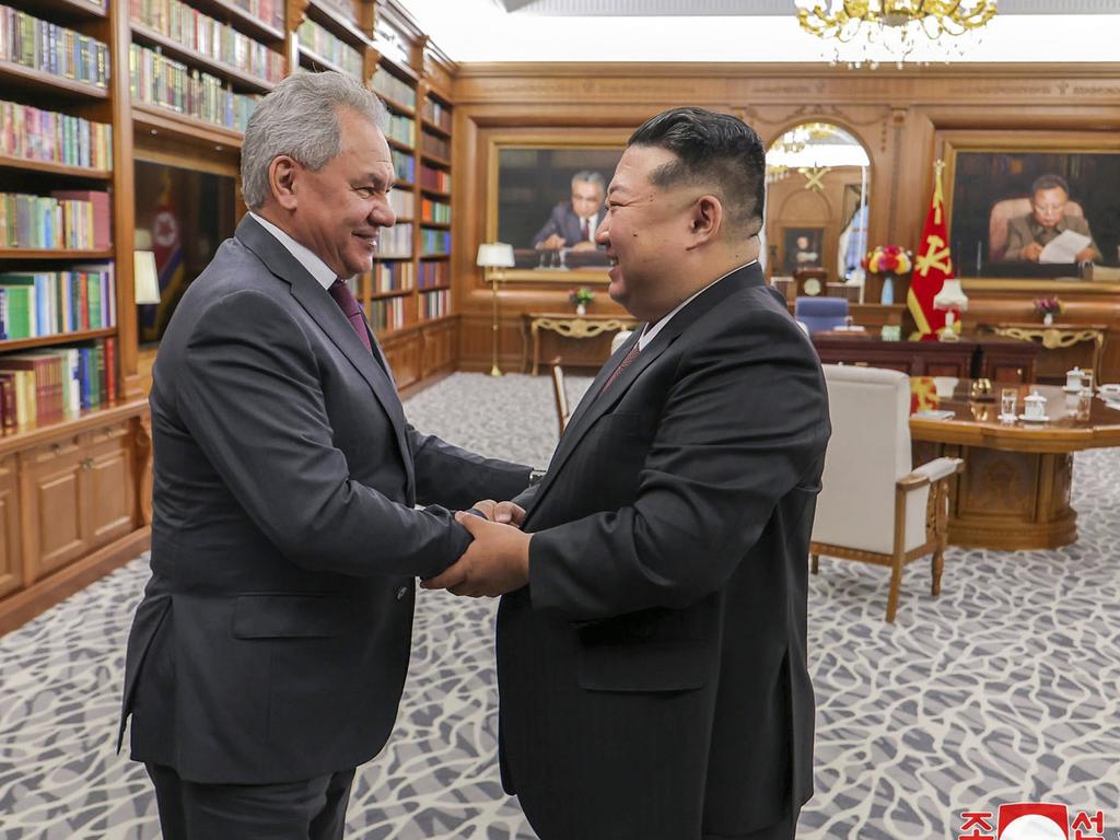 North Korean leader Kim Jong-un, right, shakes hands with Russian Security Council Secretary Sergei Shoigu in Pyongyang, North Korea. Picture: Korean Central News Agency/Korea News Service via AP