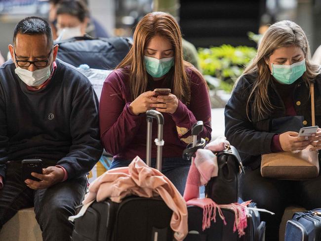 Passengers at the Los Angeles International Airport, California. Picture: Mark Ralston/AFP