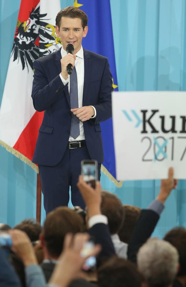 Sebastian Kurz (R), Austrian Foreign Minister and leader of the conservative Austrian People's Party (OeVP), speaks to supporters after initial results give the party a first place finish. Picture: Sean Gallup