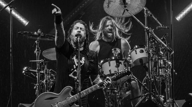 Dave Grohl (left) and Taylor Hawkins of US rock band Foo Fighters, performing at GMHBA Stadium (aka Kardinia Park) in Geelong on Friday, March 4 2022, shortly before Hawkins’ sudden death, aged 50. Picture: Brett Schewitz / Frontier Touring