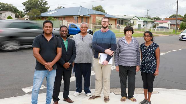 Westview Baptist Church pastor JJ Bomford and residents Livingston Chettipally, Raminder Sandu, Skate Naufahu, Iva Maras and Premi Arun are calling for urgent safety upgrades at the intersection of Crawford Rd and Coveny St in Doonside. Picture: Angelo Velardo