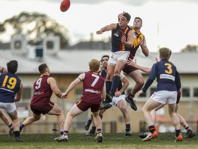 Big Bear Adam Ballard cops one high against Murrumbeena. Picture: Valeriu Campan