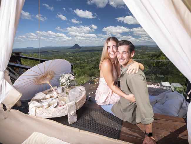 Madi Lynch 23, and Tom Kilrowe 23, celebrate their engagement at Noosa Tableands Escape where Tom's proposal was made extra special  with some help from Sunshine Coast Picnics and Proposals. Photo Lachie Millard