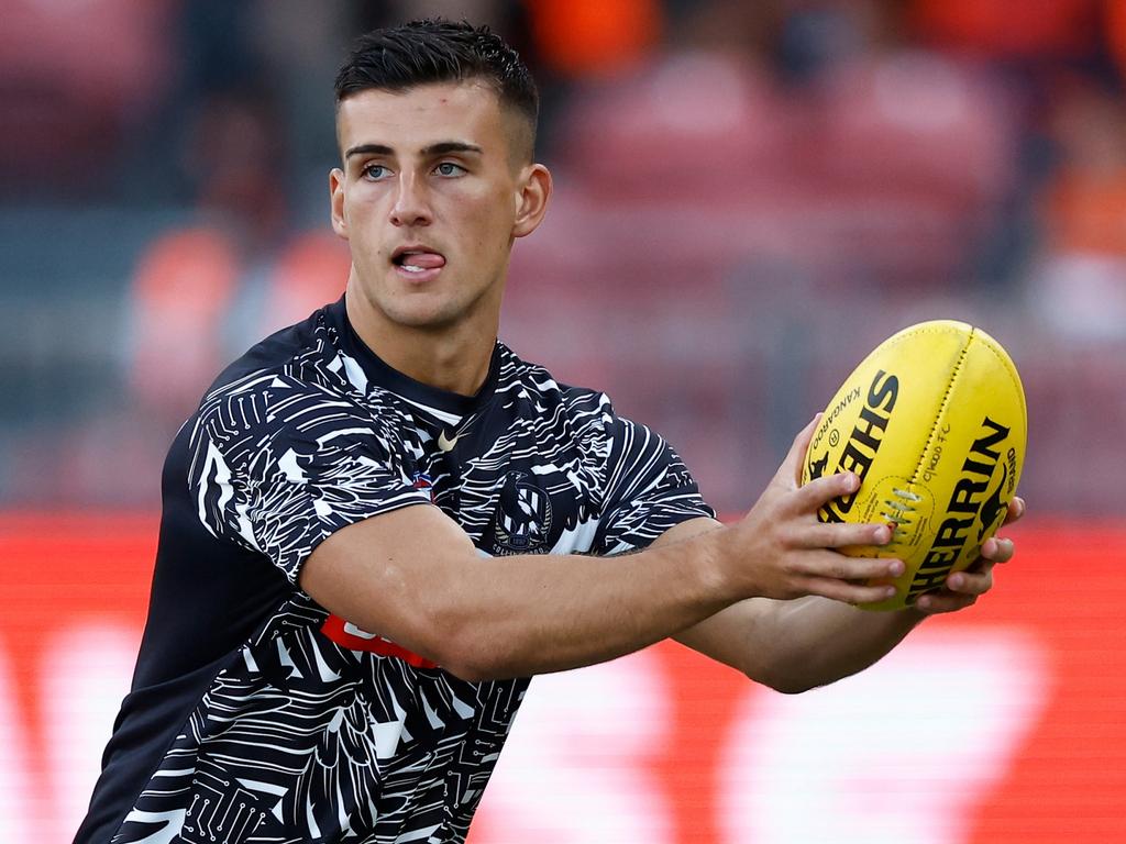 Nick Daicos warms up in opening round. Picture: Michael Willson/AFL Photos via Getty Images