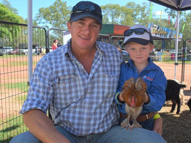 Geoff and Jack Wallis check out the petting zoo at the Proston Show on March 7, 2020. (Photo: Jessica McGrath)