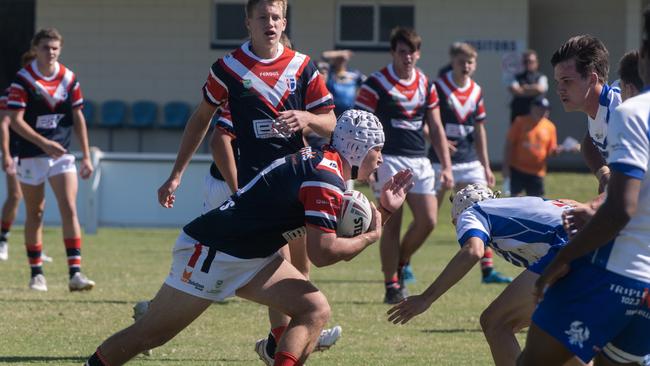 Diesel Costigan charges into the St Ignatius defence. Picture: Michaela Harlow