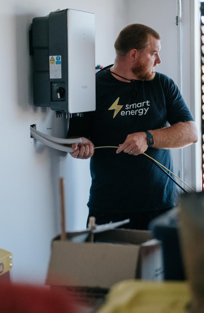 Smart Energy installer setting up the inverter. Picture: Supplied.