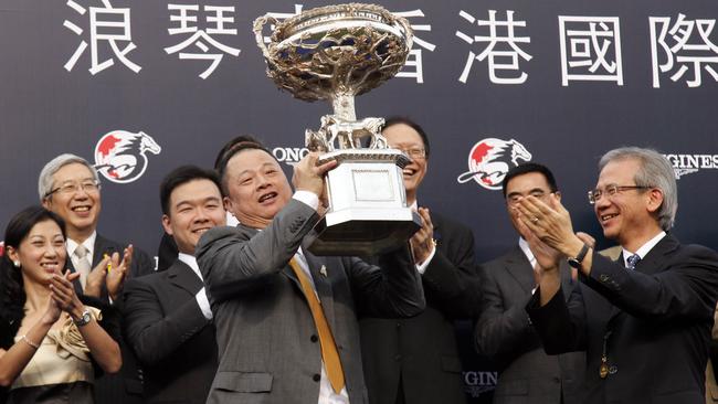 Pan Sutong at the trophy presentation for Akeed Mofeed's Hong Kong Cup victory in 2013. Picture: Hong Kong Jockey Club.