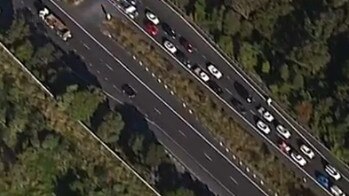 Traffic backed up near the Queensland New South Wales border on the M1 as border restrictions continue. Photo: Nine News QLD