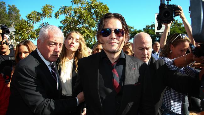 Johnny Depp and then girlfriend Amber Heard arrive at a court on the Gold Coast in April 2016. Picture: AFP