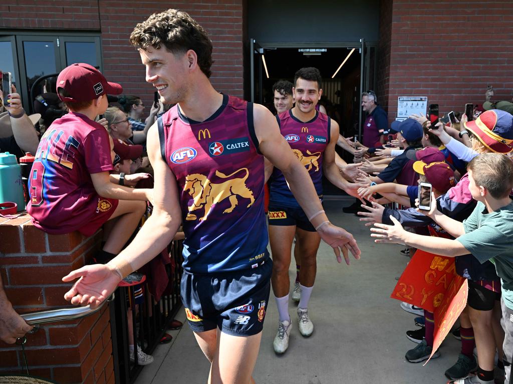 Players with fans at the Lions’ home base at Springfield in Ipswich