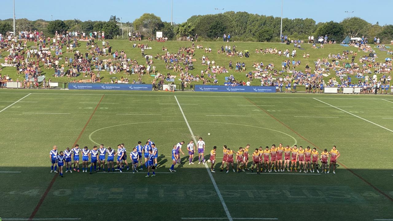 Teams gather for the national anthem before the 2024 SCGRL A-grade grand final.