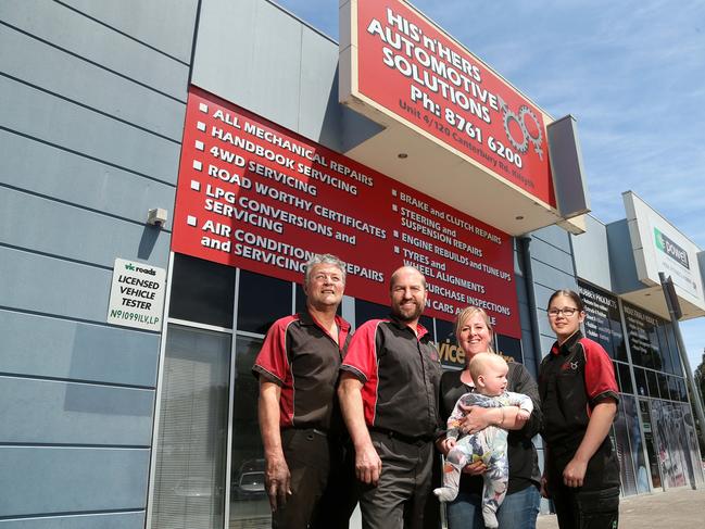 Number 4: Stuart Kent, Craig Minca, Caroline Langan-Minca, holding son Jack, and Janine Nudl at His 'n' Hers Automotive Solutions, Kilsyth. Picture: Hamish Blair