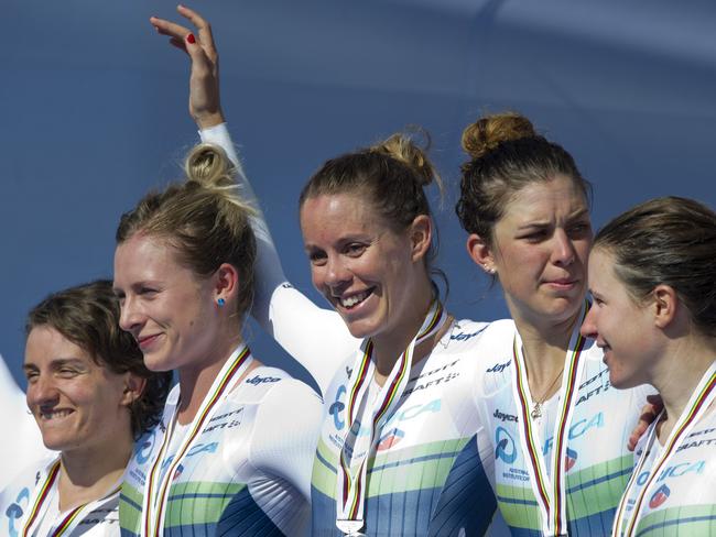 Silver medallists Australia's Orica-AIS team pose on the podium. Picture: AFP/MIGUEL RIOPA