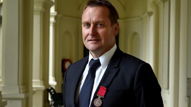 The then Detective Senior Constable Danny Shaddock with his Bravery Medal. Picture: Jay Town