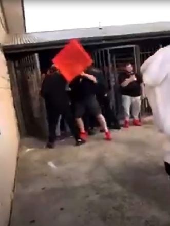 In the video, crates were seen being thrown.