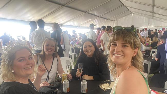 Punters dressed in their finest black and white for Derby Day celebrations in Dubbo. Photo: Tijana Birdjan