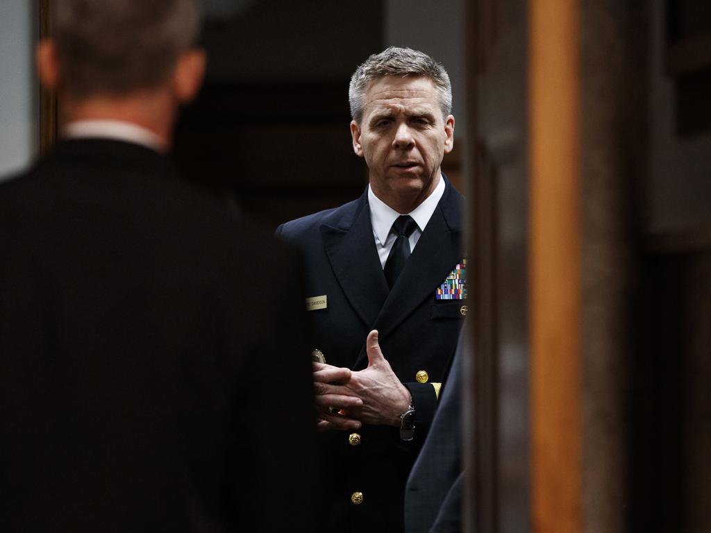 Navy Adm. Philip Davidson talks in the anteroom before testifying at a Senate Armed Services Committee hearing on Capitol Hill in Washington last week. Picture: AP