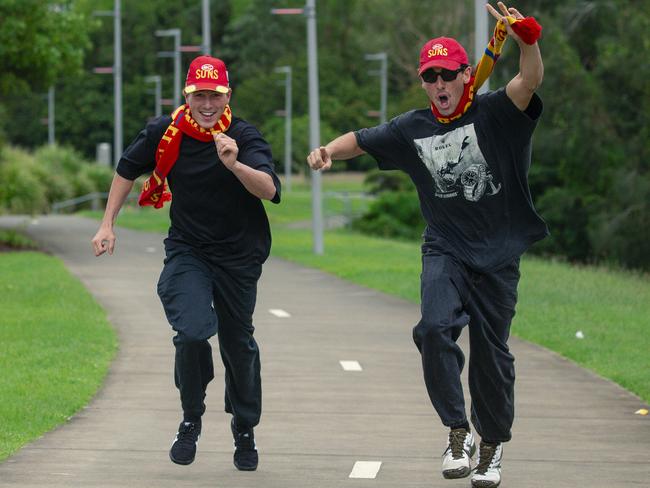 All the way from WA and running late are Suns fans Genjii Annert and Nash Margaria before the Suns V Freo at People First Stadium Cararra. Picture: Glenn Campbell