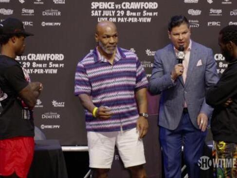 Awkward coin flip causes weak Mike Tyson toss