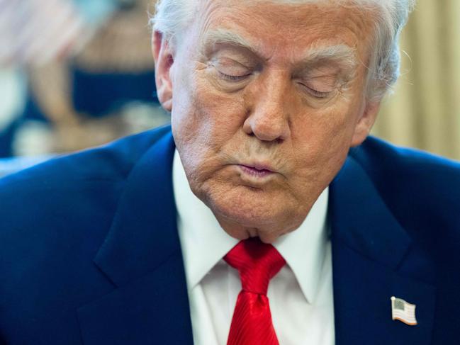 TOPSHOT - US President Donald Trump speaks after signing an executive order in the Oval Office of the White House on April 9, 2025 in Washington, DC. (Photo by SAUL LOEB / AFP)