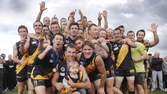 Heidelberg players celebrate their 2009 Division 1 grand final win.